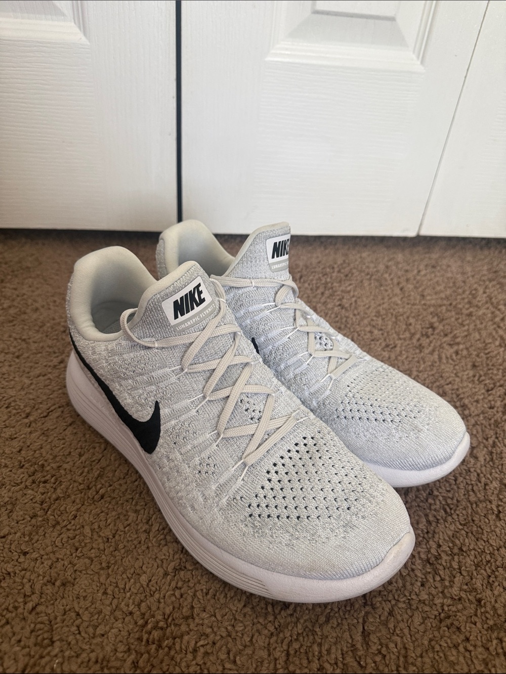 Nike Women’s Light Grey Knit Sneakers